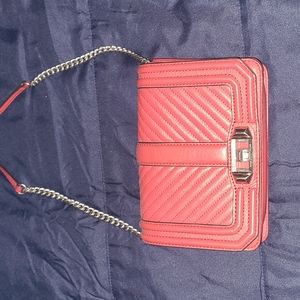 Red Rebecca minkoff bag... it has been worn but still in tack